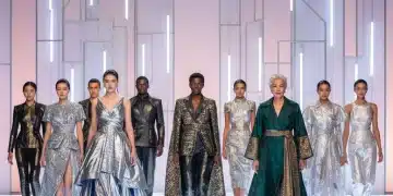 Diverse models on a futuristic runway, embodying inclusive luxury fashion aesthetics.