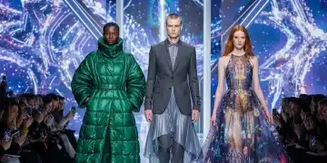 Models showcasing Fall/Winter 2026 fashion on a futuristic runway, highlighting innovative designs and opulent textures.
