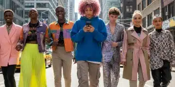 Stylish young adults demonstrating modern street style on a city street.