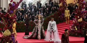 Opulent red carpet at the 2026 Met Gala with celebrities in avant-garde high fashion.